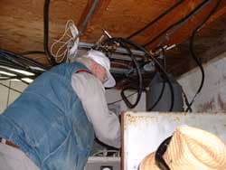 Roger making connections at the repeater installation